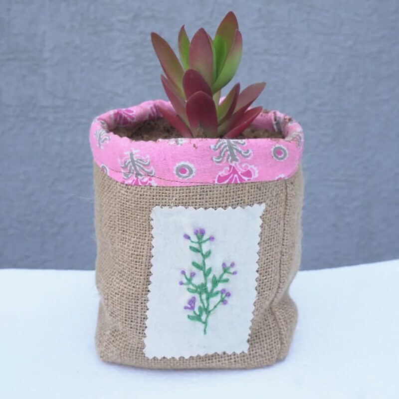 Handcrafted Fabric Jute Pot – Pink Floral Trim with Embroidered Patch